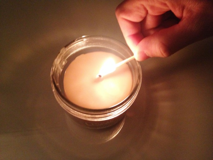 mason jar candle lit